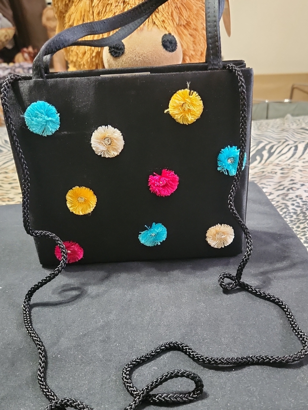 La Regale Black Mini Bag with Colorful Pom-Poms